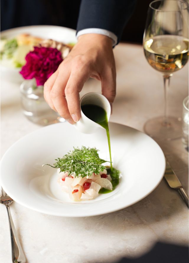Wait Staff Pouring Sauce onto a Plate at the Goldfinch Brasserie