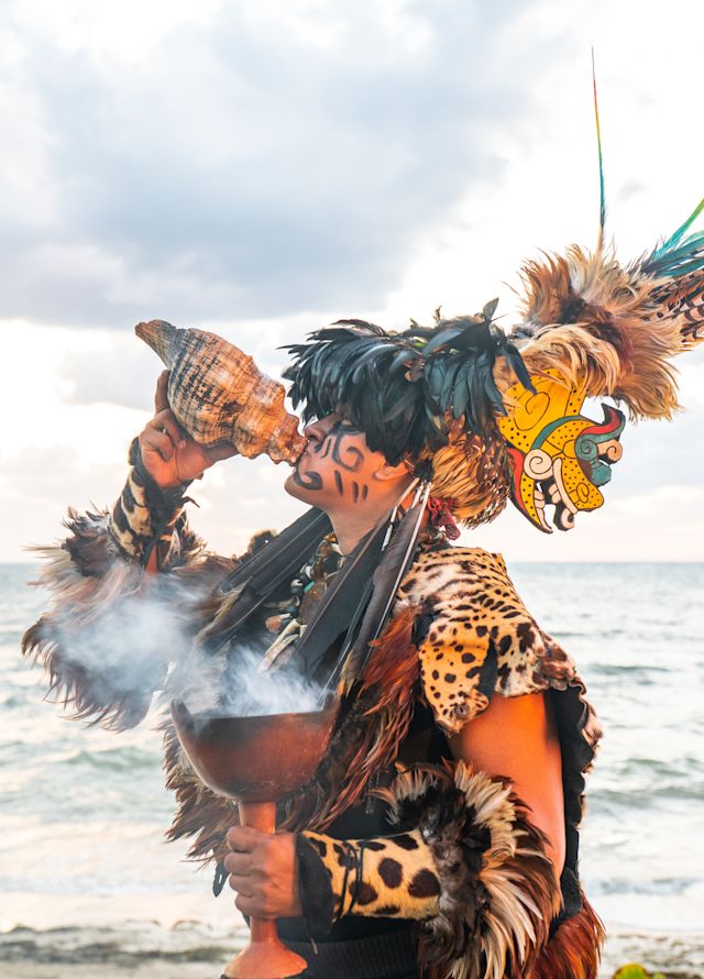 Man performs Sun Salutation in Cancun