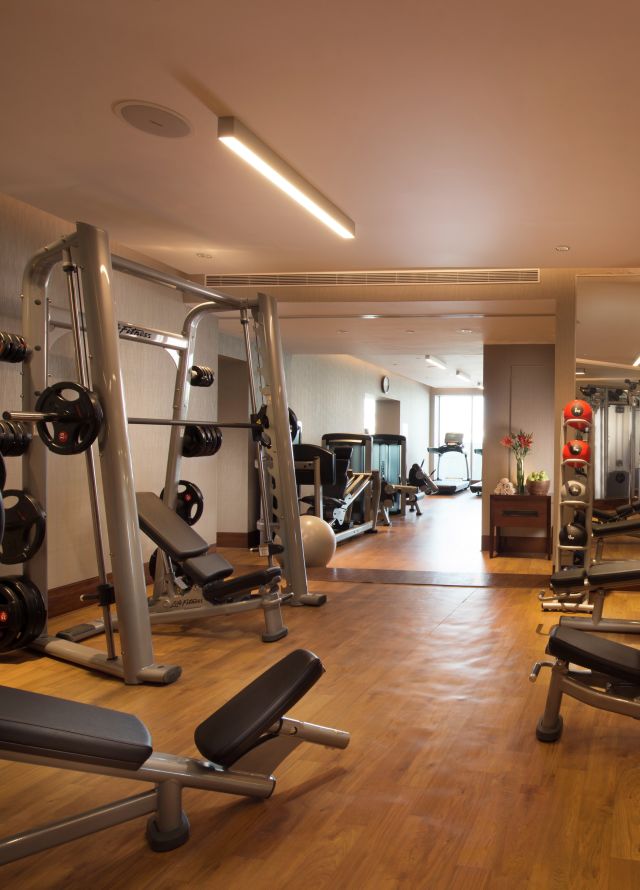 Fitness Center with Weight Benches, Weight Machine and Dumbbell Rack