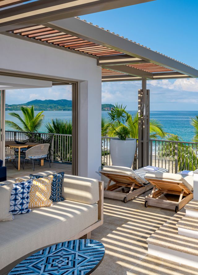 Grand Suite Terrace with Seating Area by the Pool Offering Ocean View