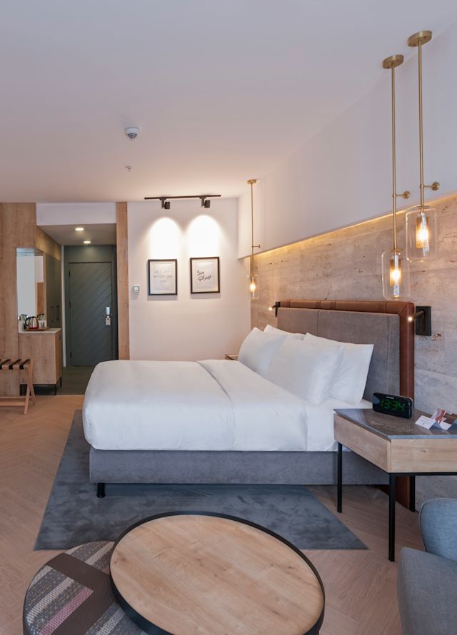 Room with Bed, TV, and Work Desk