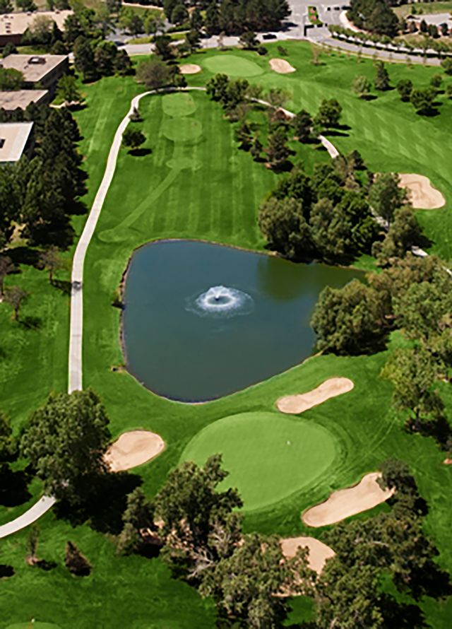 Aerial View of a Golf Course with a Fountain in a Pond - Hole 11