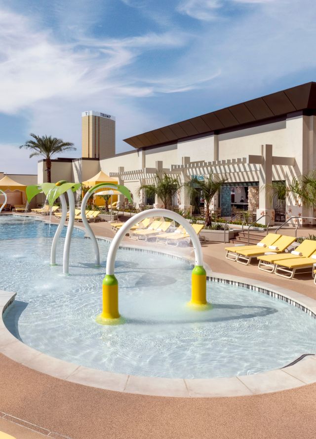 Outdoor pool with loungers