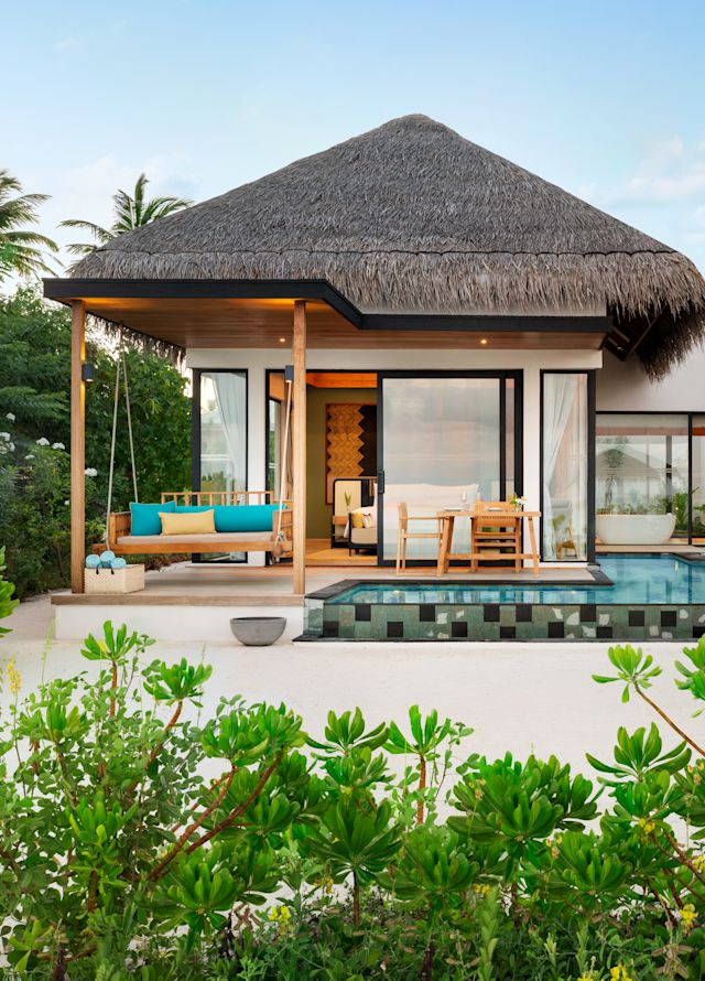villa exterior view with private pool and lounge area