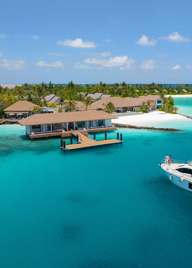 boat in the ocean in front of property