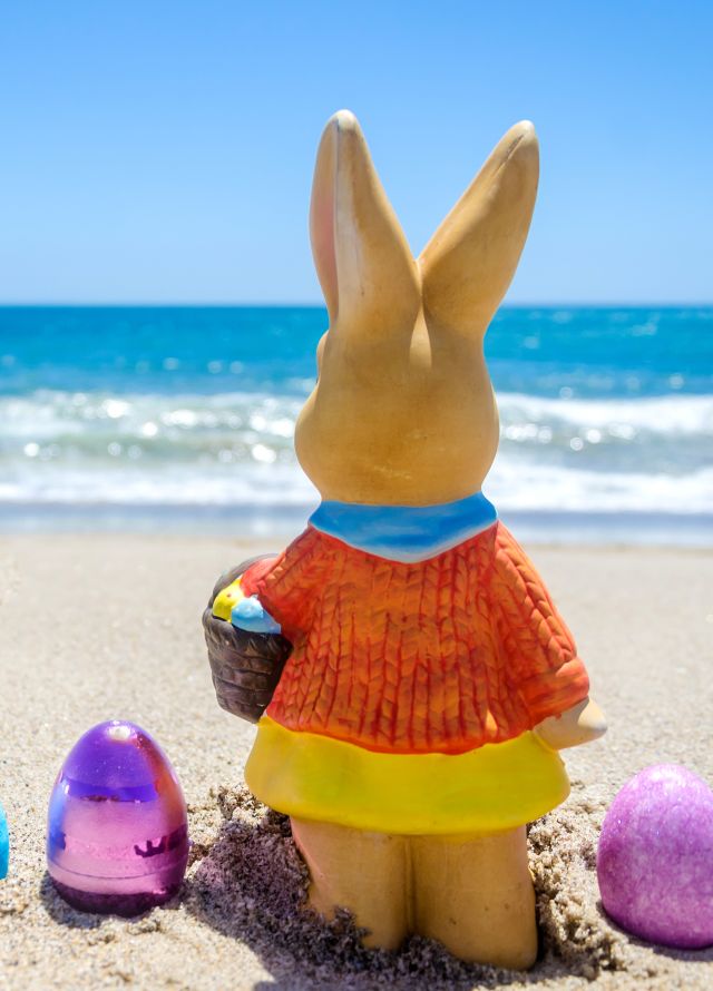Easter bunny images, with rabbit and eggs on the beach