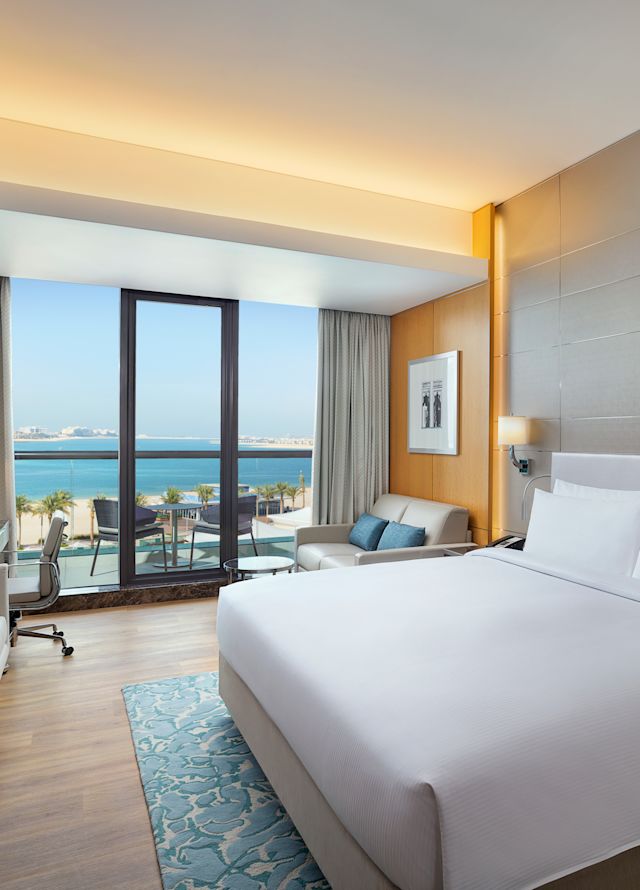 King bedroom with palm view