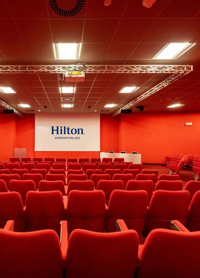 Ulisse Auditorium Setup Theater Style in Red Tones