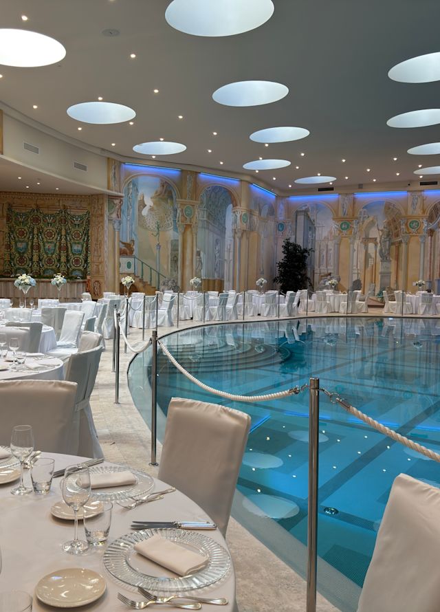 L'Affresco Meeting Room Setup with Round Tables for a Wedding Celebration