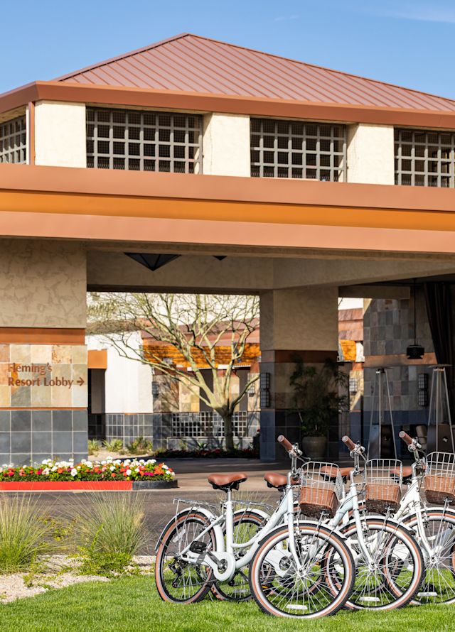 row of bikes outside hotel
