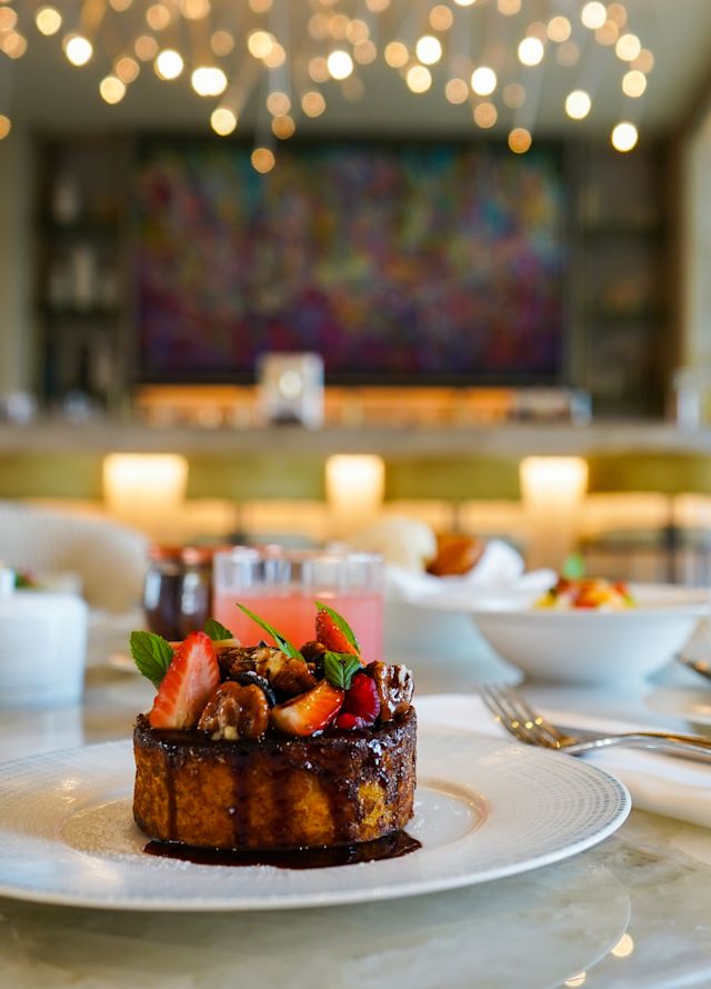 Chocolate and Strawberry Cake on a Plate in a Restaurant