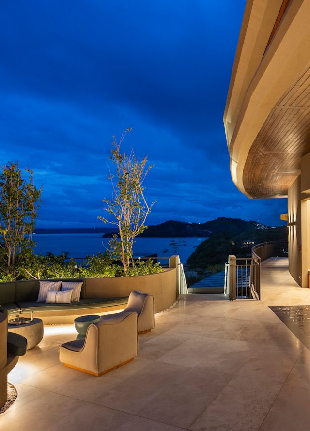 The Terrace outside seating and bar at night