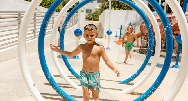 Boy Playing at the Water Park