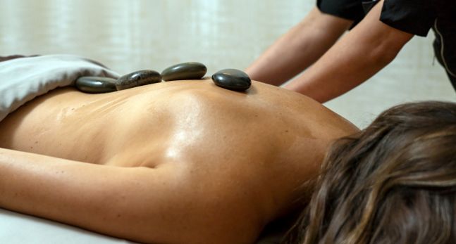 A person getting a massage at the spa