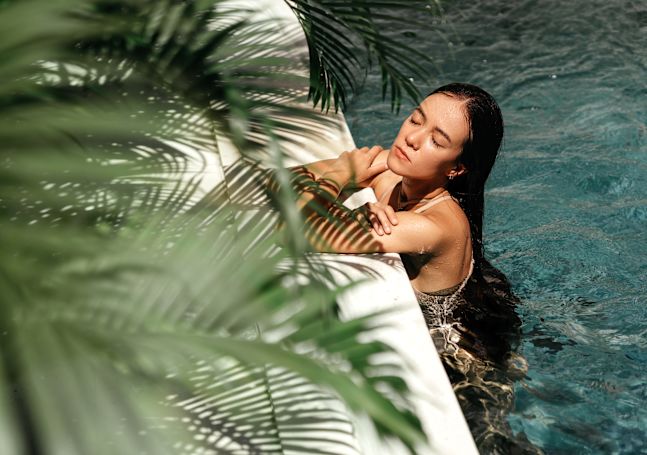 Woman at edge of pool