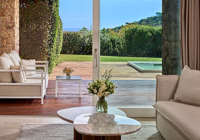 Lounge area leading to private outdoor whirlpool and garden