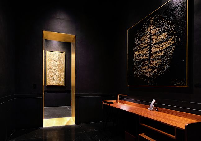 Chambre d'une suite avec bureau de travail