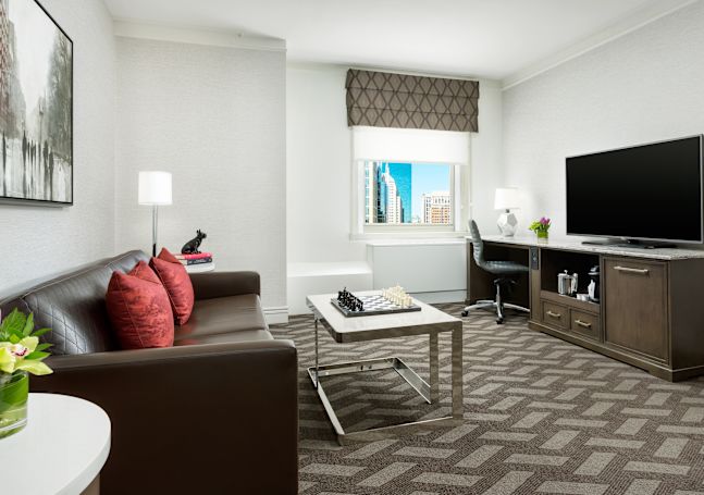 Lounge area with comfortable seating and TV