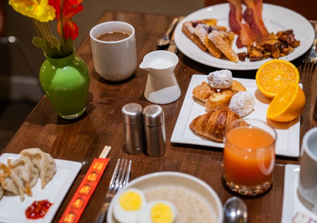 Breakfast Foods, Coffee and Orange Juice on a Table at Poached Restaurant
