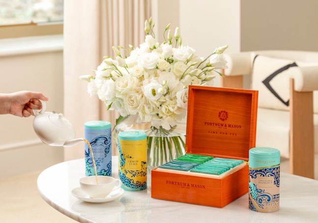 Alternate angle of tea set on table with tea cup