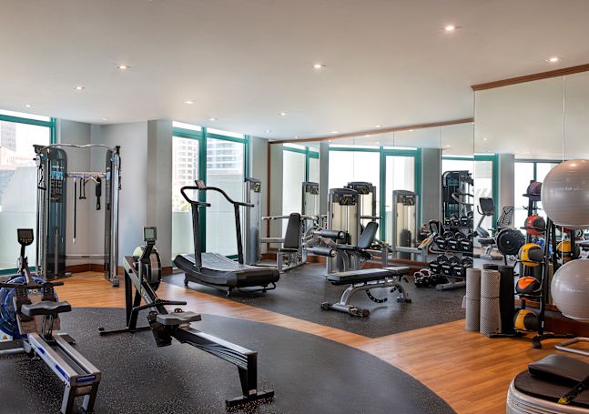 Modern Equipment in a Fitness Center with Large Windows