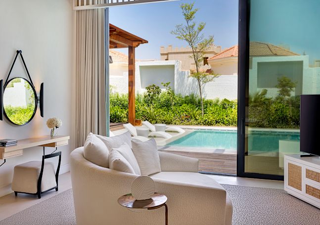 Suite Living Room with View of Private Outdoor Pool Area