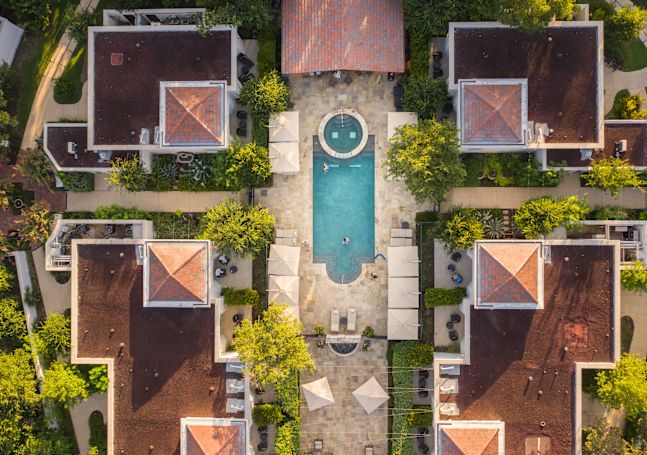 Aerial view of resort villas and outdoor swimming pool