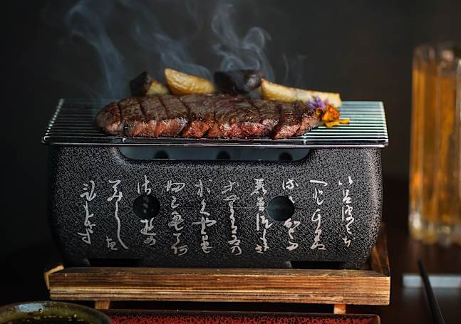 UMI restaurant, steak and potatoes on the grill