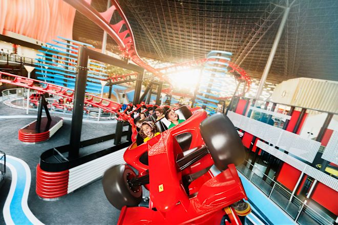 people riding Formula Rossa roller coaster at Ferrari World Theme Park