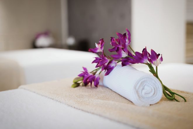 Massage room in spa resort with flower