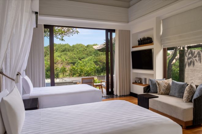 twin beds with tv and sofa