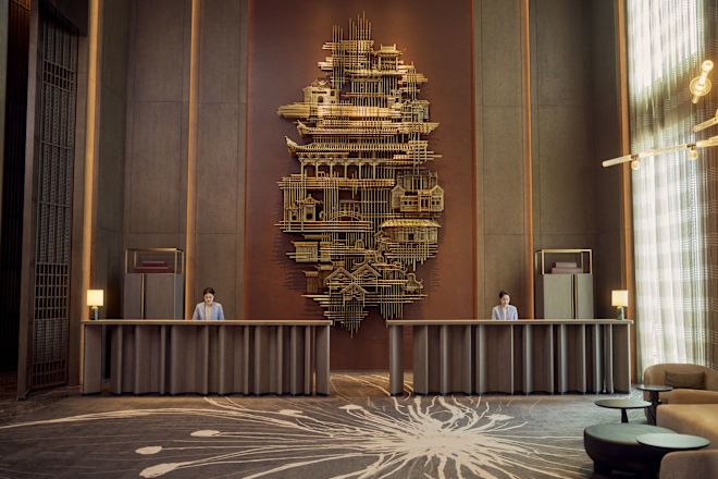 Front desk area with staff members working