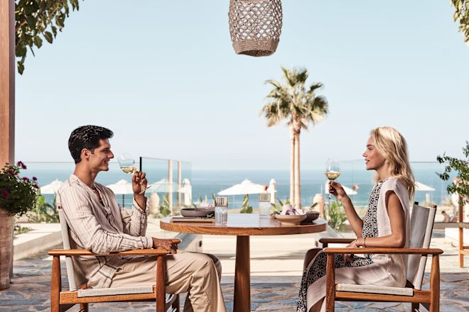 Couple Dining on the Terrace of Platia Restaurant