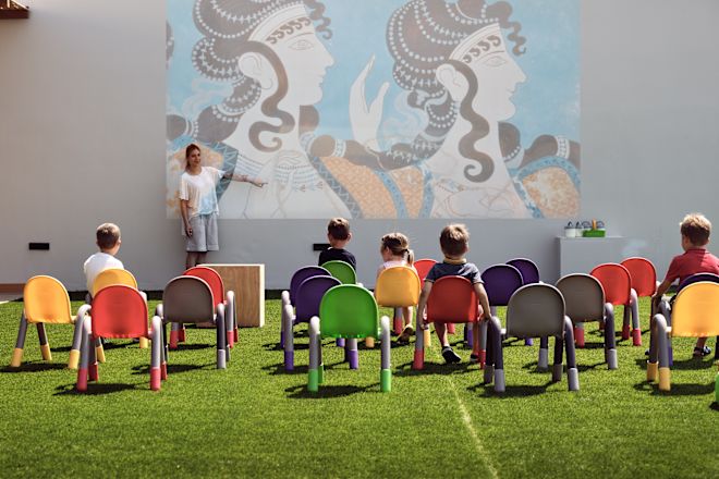 Woman Entertaining Kids Outdoors