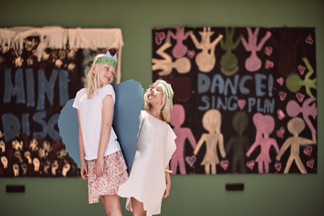 Two Girls in Angels Costumes Acting