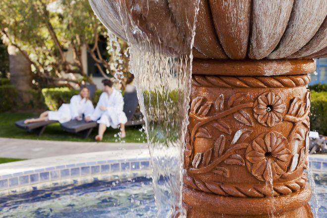 Water feature, with man and woman in background