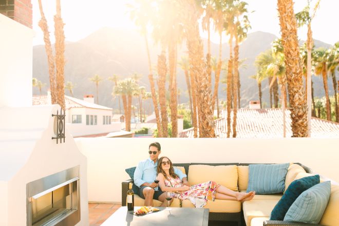 Man and woman relaxing in outdoor seating area