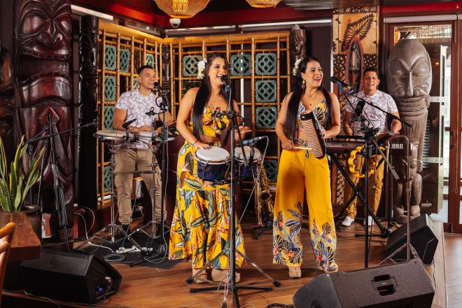 Band on stage in Trader Vics