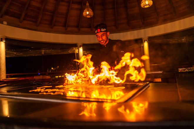 Chef Preparing Food in a Teppanyaki