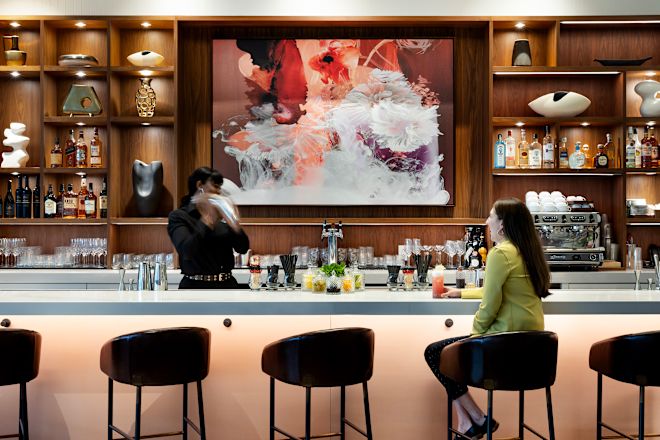 Bartender Preparing a Drink at a Bar