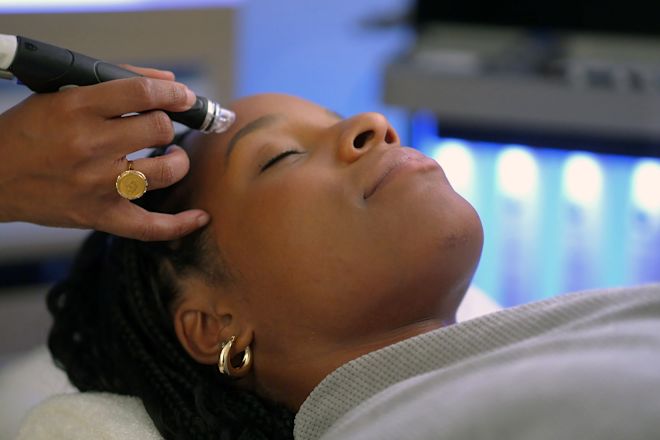 Woman Getting a Facial at Spa Signia