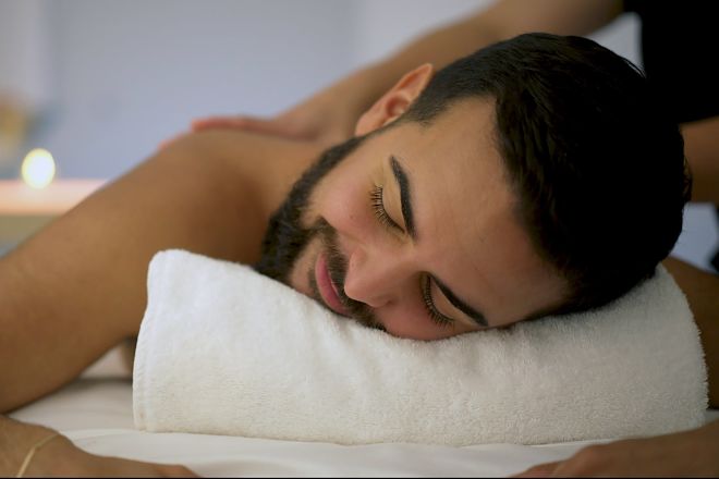 Man Getting a Massage at Spa Signia
