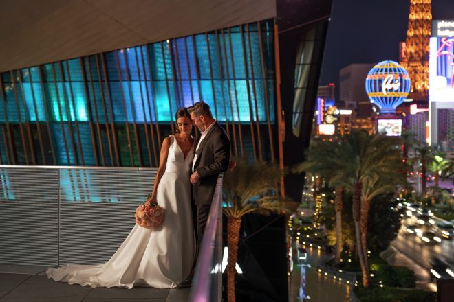 Couple on the Ballroom Balcony Overlooking the Las Vegas Strip