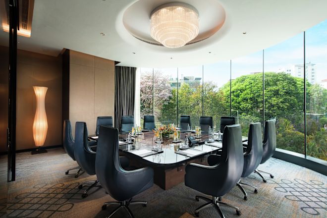 Executive Boardroom with Meeting Table and Office Chairs