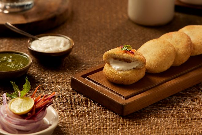 Dish with Sauces at Indian Durbar Restaurant