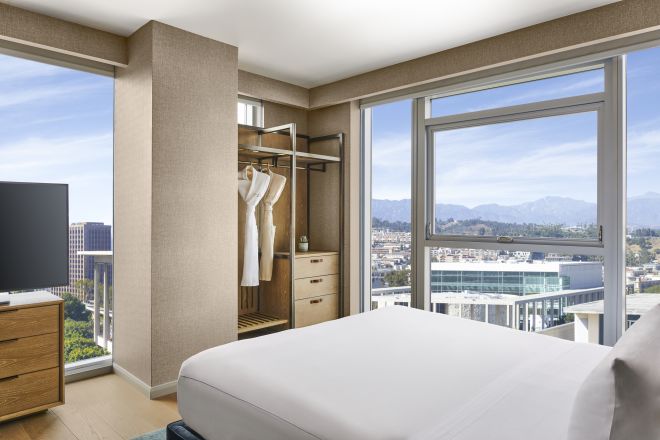guest suite, 1 king bed, tv, closet, window views