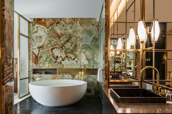 Presidential Bathroom with Round Bathtub and Sink Area