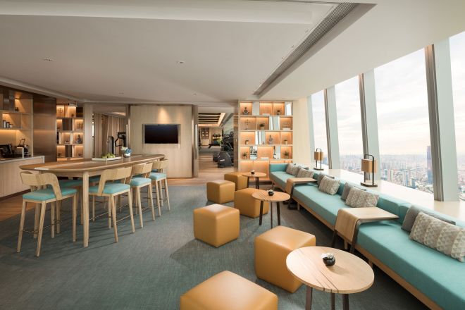 Lounge area with comfortable seating and TV