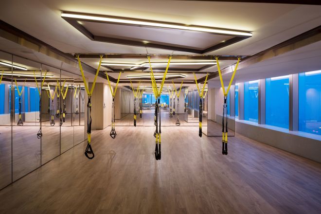 Fitness studio with mirrors and windows