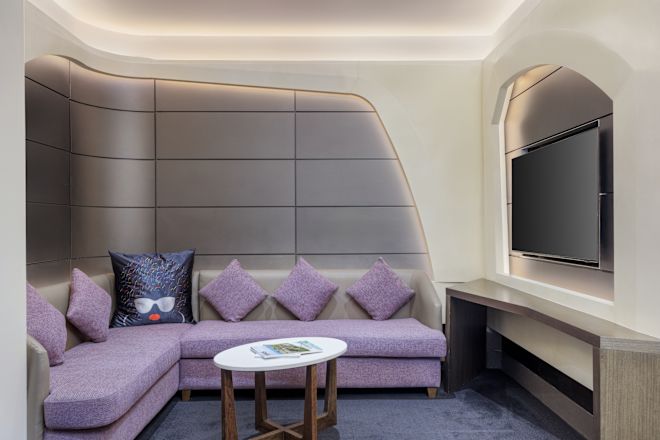Suite Living Room with TV and Large Sofa